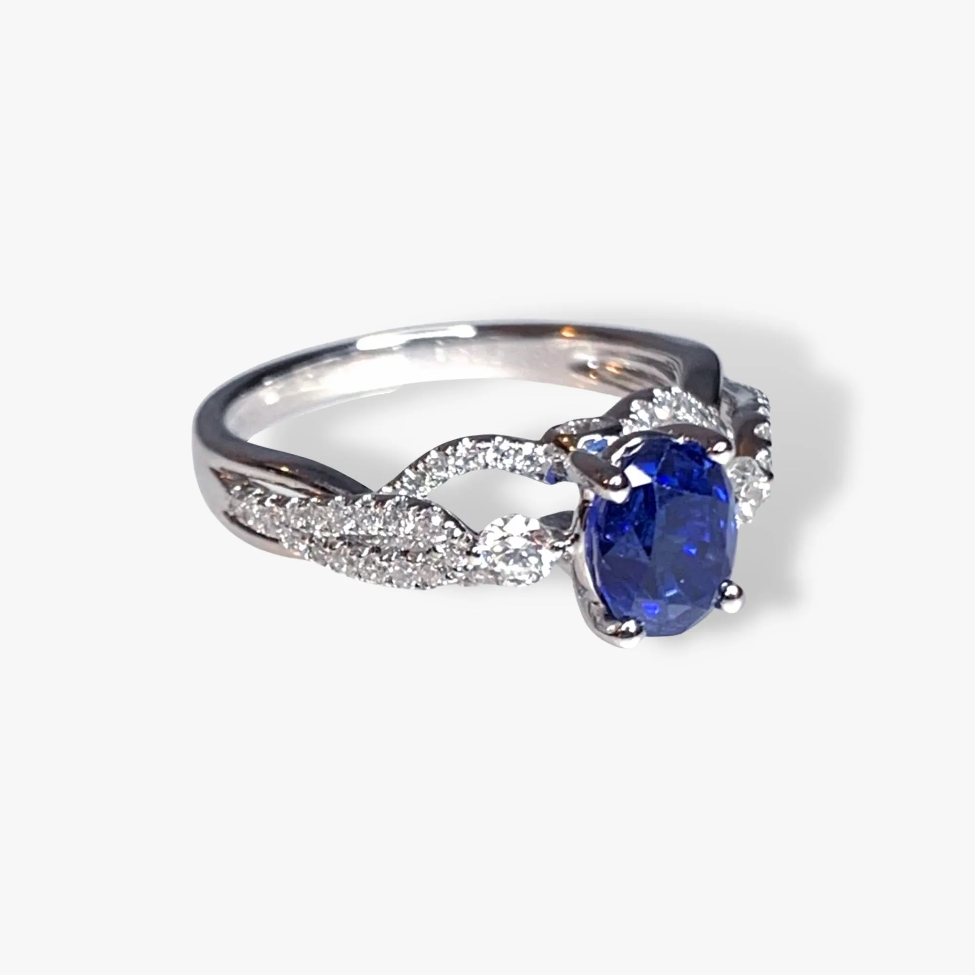 18k White Gold Oval Blue Sapphire and Diamond Twisted Shank Ring